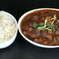 Chana masala · Chickpea curry made with green chilies, onion, garlic, fresh cilantro, a blend of spices and...