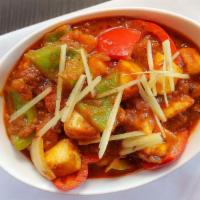 Kadai Paneer · Sauteed paneer cubes & capsicum in an onion tomato gravy flavored with special spice mixture...