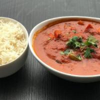 Chicken Tikka Masala · Boneless Chicken Chunks Clay oven roasted and cooked in a rich blend of Cream and Curry Sauc...