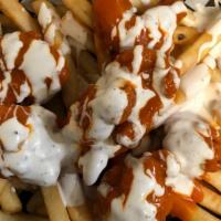 Buffalo Chicken Fries · Boneless Buffalo Chicken on a Bed of French Fries with Ranch Dressing Drizzled on Top