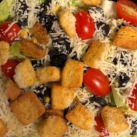 Southwest Caesar Salad · Fresh, Crisp Romaine Lettuce, Sweet Corn, Black Olives, Fresh Tomatoes, Parmesan Cheese and ...