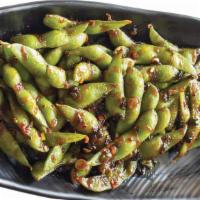 House Edamame · Soybeans tossed in house special sauce.