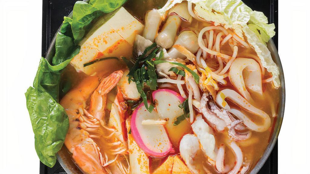 Thai Seafood Pot · Spicy. Napa cabbage, spinach, shrimp, straw mushrooms, soft tofu, squid rings, fish, fish balls with roe, fish cake, kamaboko fish cake, imitation crab, green onions and vermicelli noodles in Thai style broth.