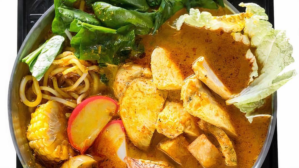 Chicken Curry Pot · Napa cabbage, spinach, taro, potatoes, carrots, corn, fried tofu, chicken breast and udon noodles in a house curry broth.