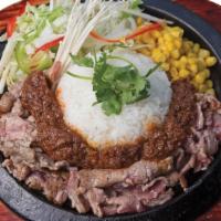 Mam Mam · Sliced prime beef with house sauce, steamed rice and sizzle basics.