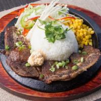 Story Road Short-Ribs · House grilled short rib steamed rice and sizzle basics.