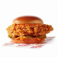 Spicy Chicken Sandwich · An extra crispy filet with premium pickles, spicy mayo, on a brioche-style bun, and a dippin...