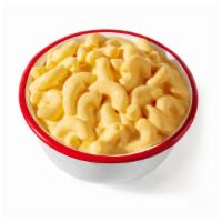 Mac & Cheese · Elbow macaroni covered in a rich, creamy cheddar cheese sauce.