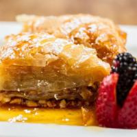 Baklava · The most famous Greek pastry! Layers of phyllo dough, walnuts, cinnamon, sugar and Greek hon...