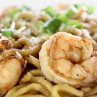 Shrimp Garlic Noodles · Egg noodles and shrimp tossed in our house-made signature garlic butter and topped with gree...
