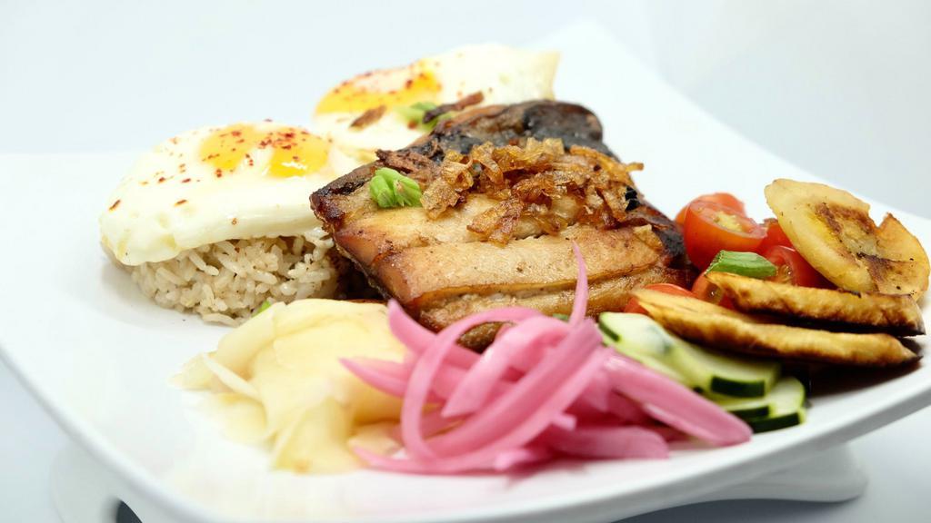Bangsilog (Daing na Bangus)  · Bangsilog (Daing na Bangus) – Boneless milkfish belly in a tangy-sweet marinade and deep-fried till golden. 
Served with garlic fried rice, two-fried eggs, a selection of pickled veggies and slices of fresh tomatoes & cucumber.  Also comes with a seasoned vinegar dip.