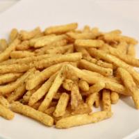 Plain Fries · Salt and peppered straight cut fries.