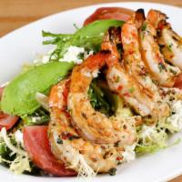 Grilled Shrimp Salad · Grilled shrimp, arugula, tomatoes, avocado and homemade queso fresco with a lemon shallot dr...