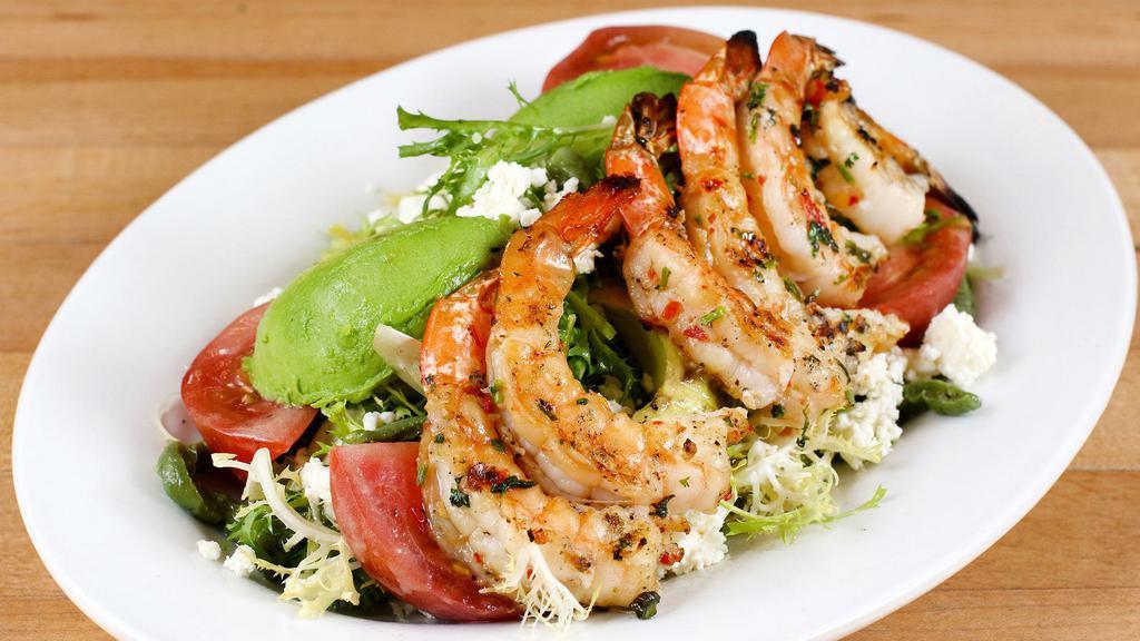 Grilled Shrimp Salad · Grilled shrimp, arugula, tomatoes, avocado and homemade queso fresco with a lemon shallot dressing.
