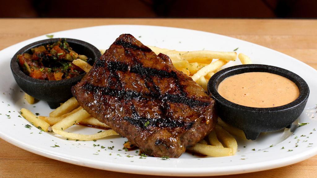 Carne Asada Plate · Grilled 10 ounce grass fed NY steak with fries, chipotle aioli and salsa molcajete.