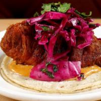 Bajataco · Negra modelo batter deep fried rock cod, chipotle remoulade and purple cabbage slaw. With la...