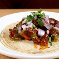 Pastor · Marinated pork shoulder, roasted pineapple, onions, cilantro, and salsa verde. With la palma...
