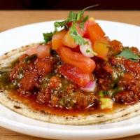 Papa con Chorizo · Home-made Mexican chorizo, potatoes, salsa verde, and pico de gallo. With la palma organic c...