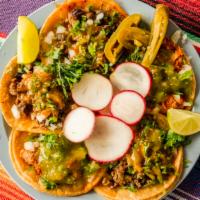 Tacos · Tacos come with onion, cilantro and salsa