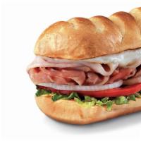 Hook & Ladder® , Large (11-12 Inch) · Smoked turkey breast and honey ham smothered with Monterey Jack, served Fully Involved® (may...