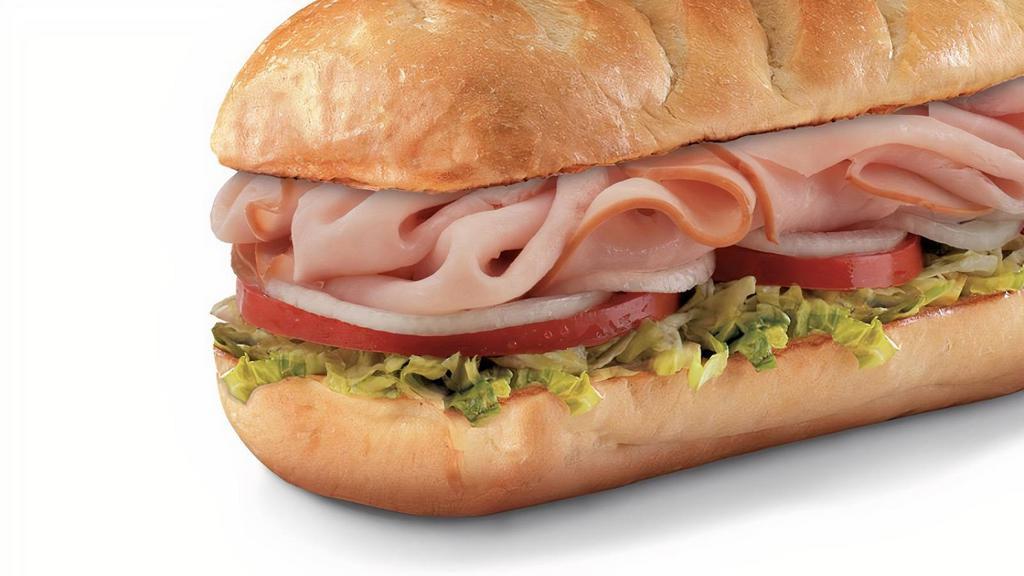 Smoked Turkey Breast  , Small (3-4 Inch) · Smoked turkey breast and Provolone, served Fully Involved® (mayo, lettuce, tomato, onion, deli mustard, and a pickle spear on the side).