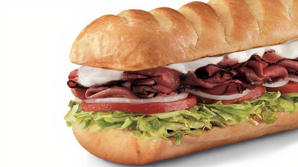 Pastrami, Large (11-12 Inch) · Pastrami and provolone, served Fully Involved® (mayo, lettuce, tomato, onion, deli mustard, and a pickle spear on the side).