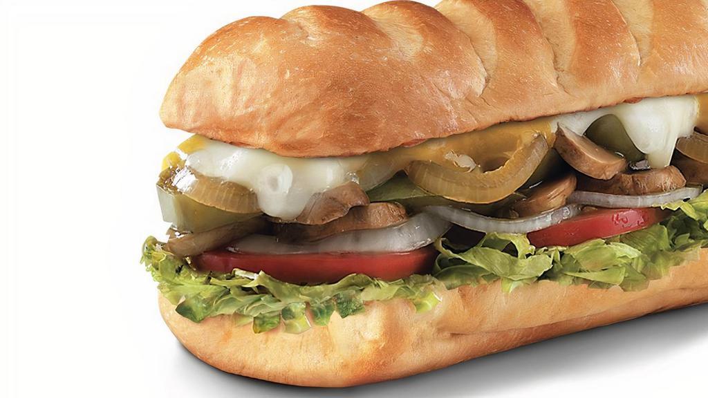 Veggie, Large (11-12 Inch) · Onions, bell peppers, and mushrooms topped with Provolone, Monterey Jack and Cheddar Cheese and Italian dressing, served Fully Involved® (mayo, lettuce, tomato, onion, deli mustard, and a pickle spear on the side).