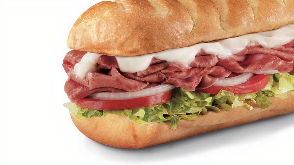 Corned Beef Brisket , Large (11-12 Inch) · Corned beef brisket and melted provolone, served Fully Involved® (mayo, lettuce, tomato, onion, deli mustard, and a pickle spear on the side).