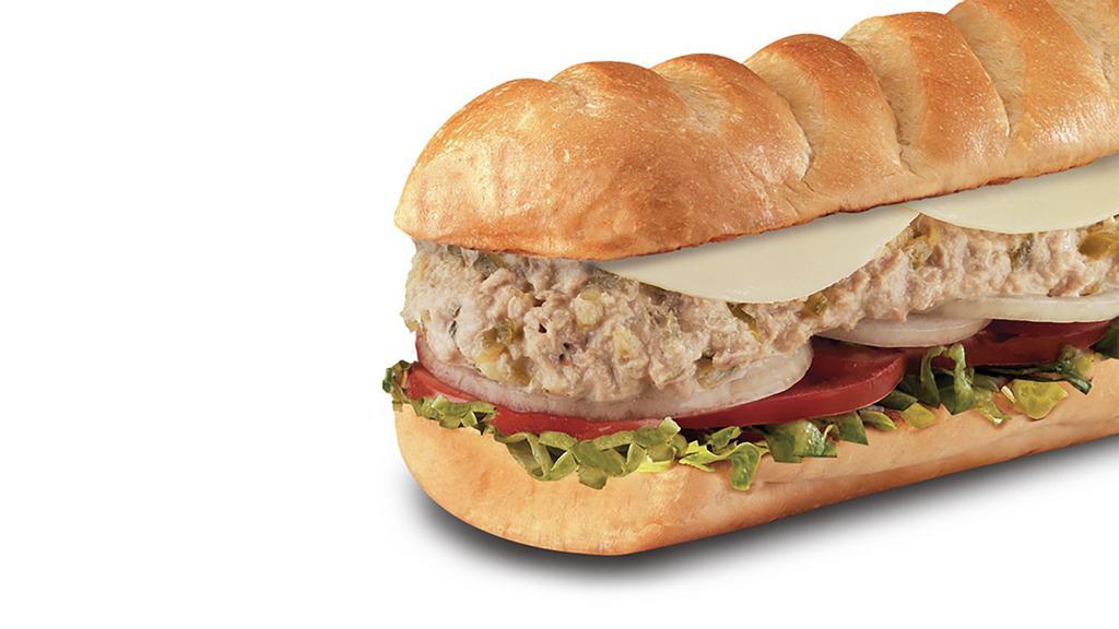 Tuna Salad , Large (11-12 Inch) · A blend of tuna, mayo, relish and black pepper topped with Provolone, served Fully Involved® (mayo, lettuce, tomato, onion, deli mustard, and a pickle spear on the side).