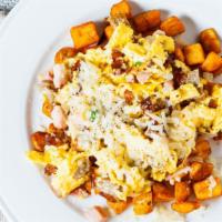 Country Inn Skillet · Scrambled eggs, bacon, sausage, ham, onions, jack and cheddar, country potatoes, toast or pa...