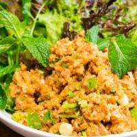 Nam Kao · Crisped rice and Lao sausage salad, fresh herbs, lettuce wrap (gf)