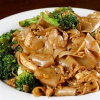 Pad Siew · Vegetarian available. White rice noodles sauteed in a dark soy sauce with broccoli, egg and ...