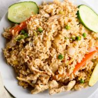 Pineapple Fried Rice · Vegetarian available. Pineapple fried rice with choice of prawns, chicken, beef, pork or veg...