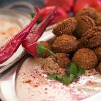 Falafel Spicy Plate  · 6PC Falafel, French Fries & Tahini Sauce & Topped with homemade hot sauce