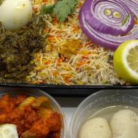 Fpack gongura mutton biryani-Spicy(Chef Spl) · Family pack gongura mutton biryanis is made of dum ka rice with pan fried bone in goat fry a...