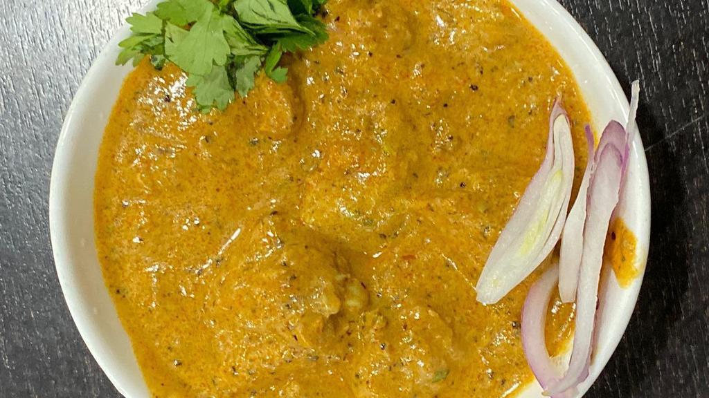 Chicken Chettinad- Spicy · Chicken cooked with whole spices and poppy seeds paste in house special.