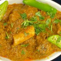 Goat Curry( Spicy) · A classic North and South Indian dish baby goat in a cardamom sauce.  not possible to make M...