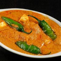 Paneer Aur Mirchi Ka Salan- Medium Spicy · Homemade, spiced paneer with green long horn pepper in roasted peanut and tamarind gravy.