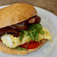Bacon and White Cheddar Sandwich · Two scrambled eggs, tomato, arugula, warm pain de mie bun +bacon 3.75, kale 2.