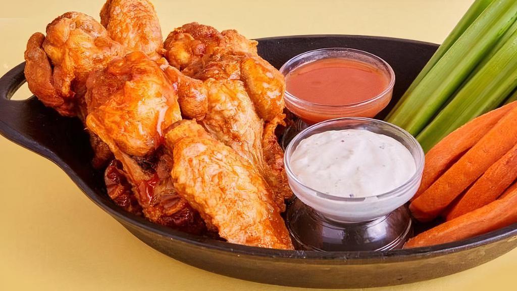 Mango Habañero Wings · Classic Bone-In Wings, this delectable sauce is sweet with a habanero spiced kick for that perfect balance.