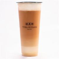 E1. Black Tea Latte with Crema/ 姗媚红茶拿铁 · Dark and malty tea flavor topped with our rich and silky crema