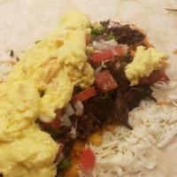 Breakfast Burrito · Scrambled Eggs, Rice, Beans, Cheese, and Pico de Gallo. Salsa Verde on the Side.