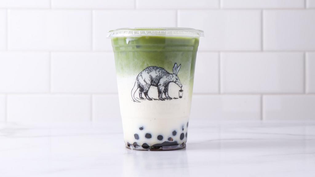 Matcha Latte · Hand-whisked organic premium-grade matcha served over a bed of milk. Contains honey.