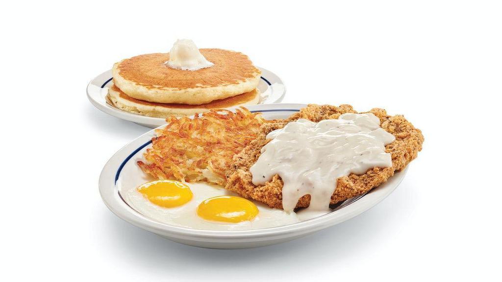 Country Fried Steak & Eggs · Golden-battered beef steak smothered in hearty gravy. Served with 2 eggs* your way, golden hash browns & 2 fluffy buttermilk pancakes.
