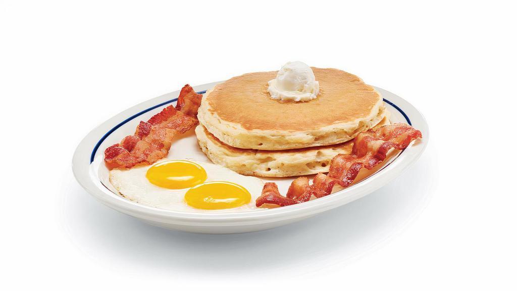 2 X 2 X 2 · Two eggs* your way, 2 custom-cured hickory-smoked bacon strips or 2 pork sausage links & 2 fluffy buttermilk pancakes. .