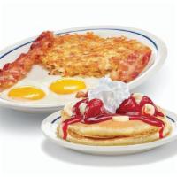 Create Your Own Pancake Combo · Choice of any 2 same-flavored pancakes, served with 2 eggs* your way, 2 custom-cured hickory...