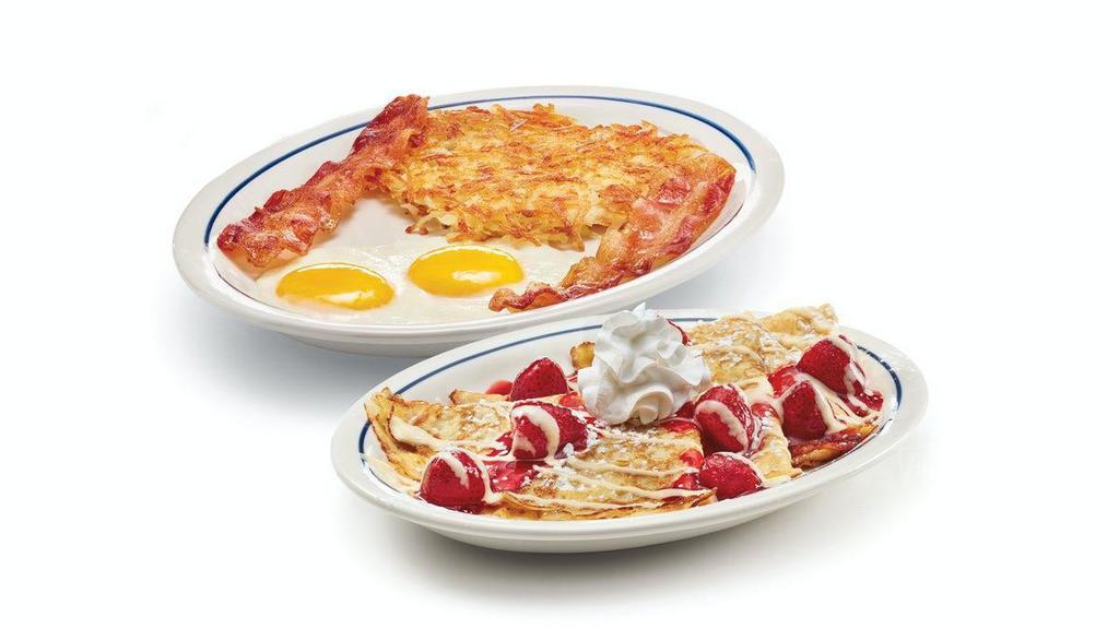 Create Your Own Crepe Combo · Choose your crepe flavor, served with 2 eggs* your way, 2 custom-cured hickory-smoked bacon strips or 2 pork sausage links & golden hash browns.