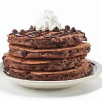 Chocolate Chocolate Chip Pancakes  · We think chocolate is perfect any time of day. Four fluffy chocolate pancakes filled with ch...