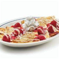 Strawberries & Cream Crepes · Four delicate crepes topped with glazed strawberries & vanilla cream drizzle.