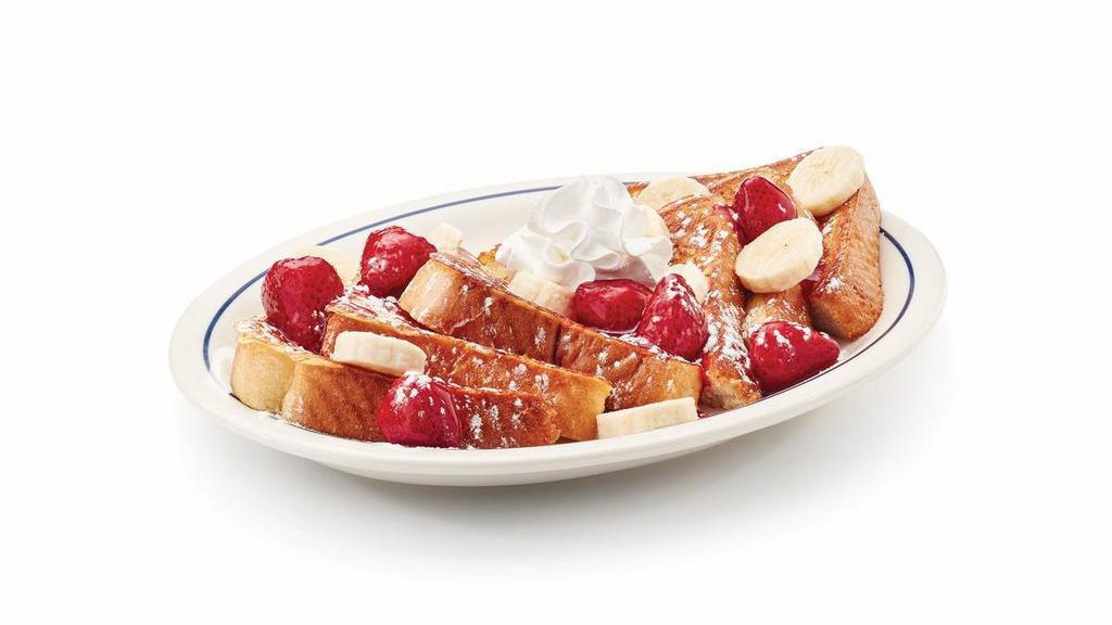 Strawberry Banana French Toast · Our original thick-cut French toast topped with glazed strawberries & fresh banana slices, dusted with powdered sugar.
